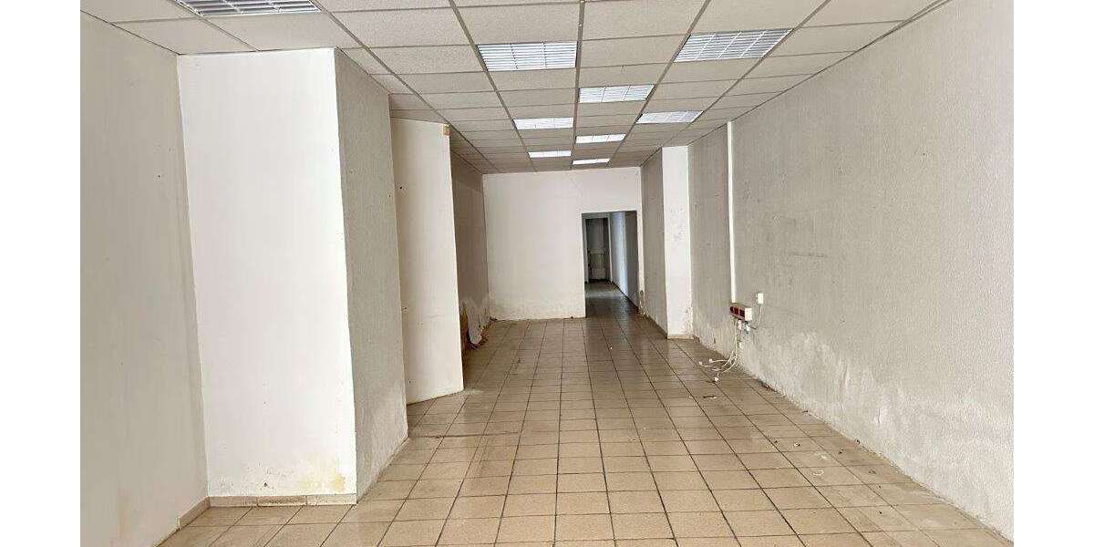 Kapitalanlage : Wohn- und Geschäftshaus mit 3 Wohneinheiten und 1 Gewerbeeinheit in 